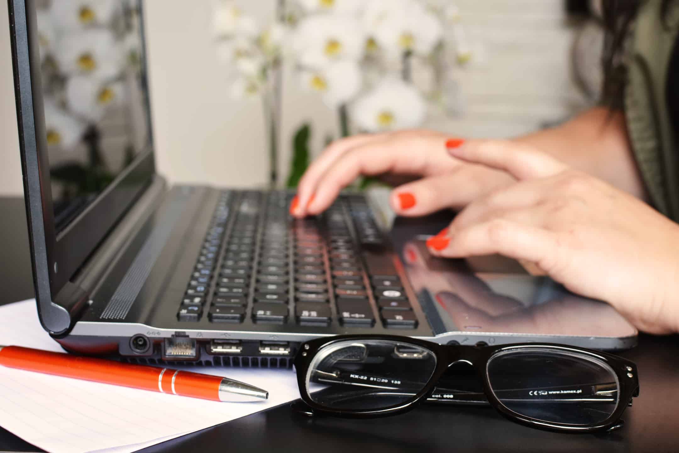 Woman Working on Laptop From Home