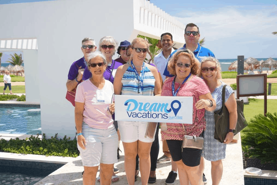 How does Dream Vacations Franchise work? This group of travel agents work together, in a group photo