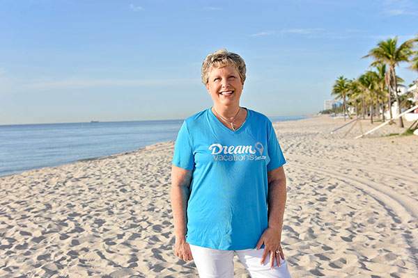 Dream Vacation travel agent on the beach