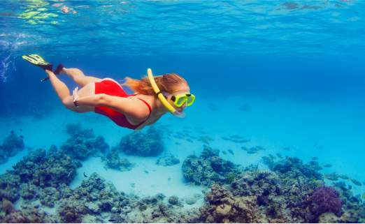 A woman snorkeling