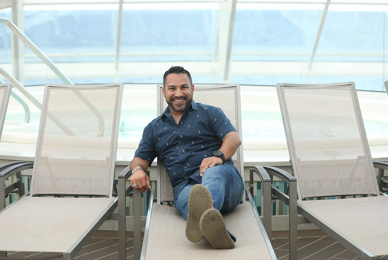 Dream Vacation Franchise lounging on a pool chair