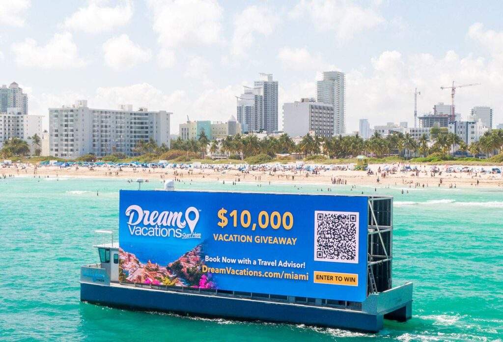 A floating billboard advertising a Dream Vacations giveaway