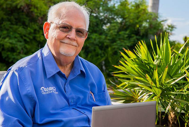 older man with a laptop