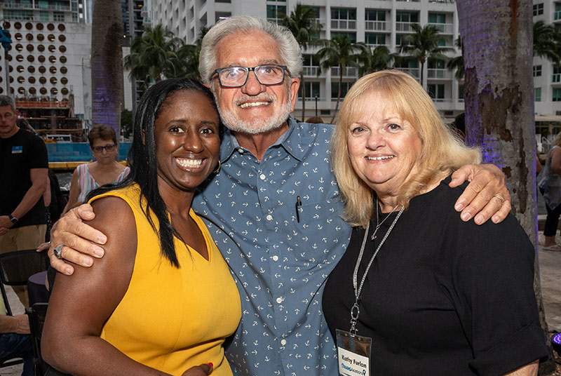 three retirees posing for a picture