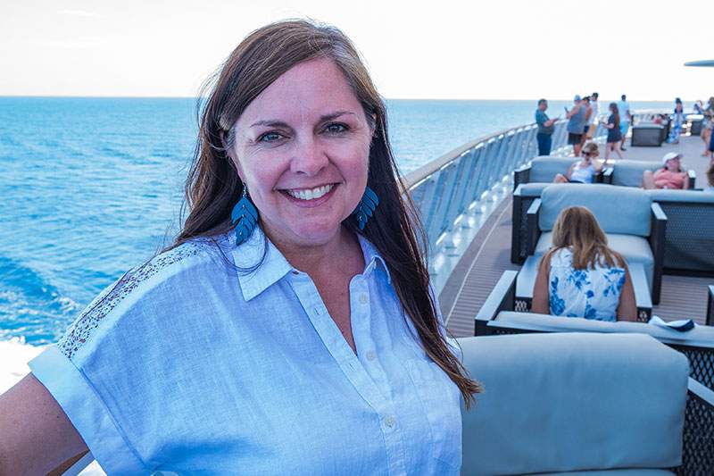 woman posing on a ship