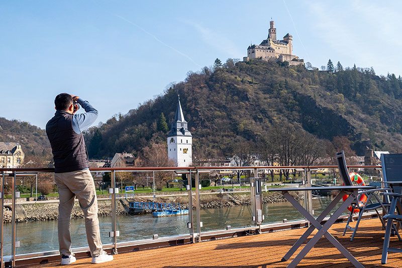 Dream Vacations Franchise Owner taking photos on exploration trip.