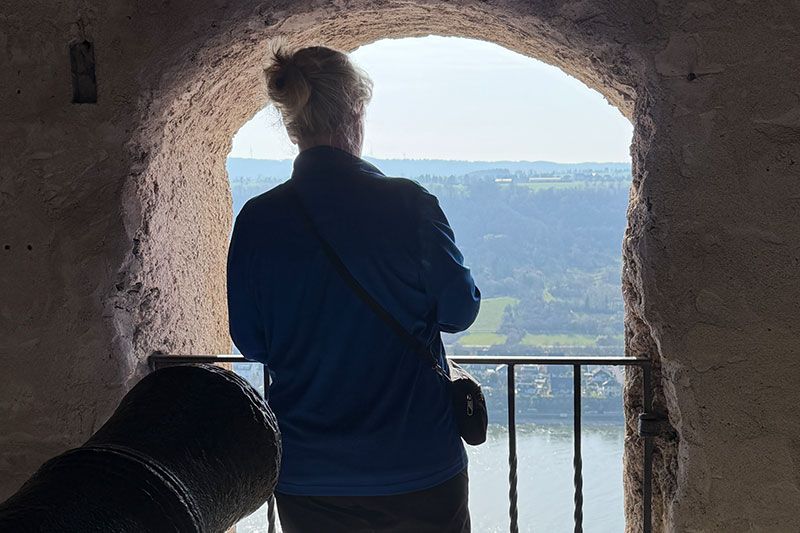 woman looking out to the water